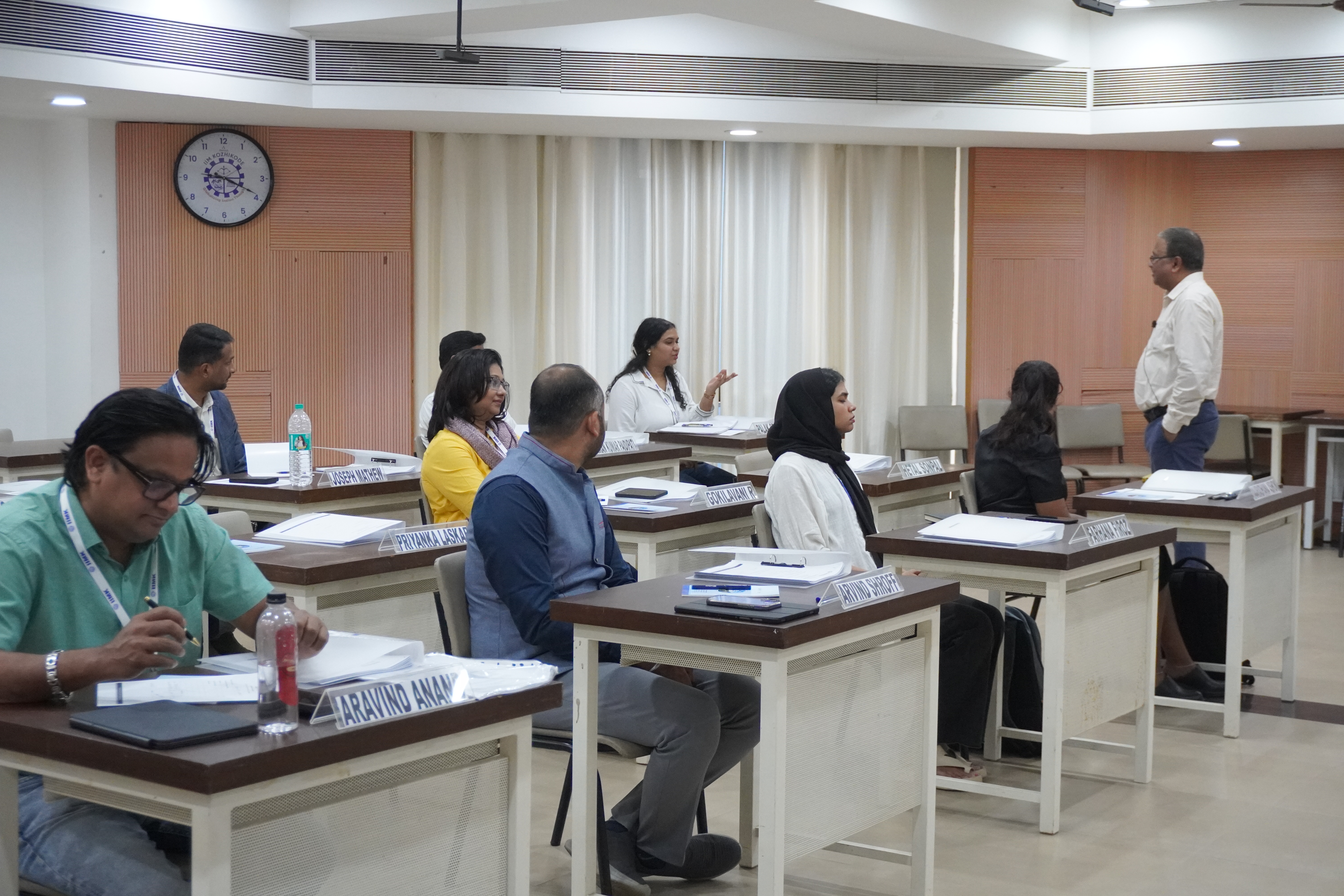 Faculty mentor interacting with participants